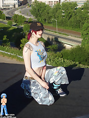 hip chick strips and spreads wide on rooftop