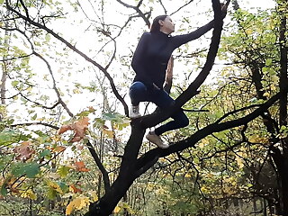 Girl masturbates on a tall tree in a public place - Lesbian-illusion