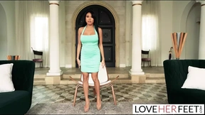 Tiny Ember Snow, seductive and captivating, teases with sensual footplay.