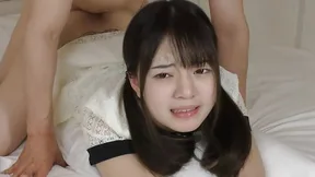 An elegant, slender Asian woman, skilled in intimate pleasures, seduces passionately.