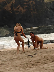 Blonde mistress rides her slave`s back and makes him eat her pussy right on the beach