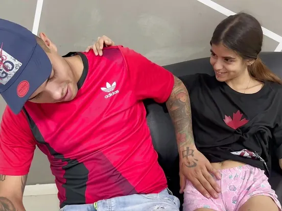 I’m in the living room of my house, waiting